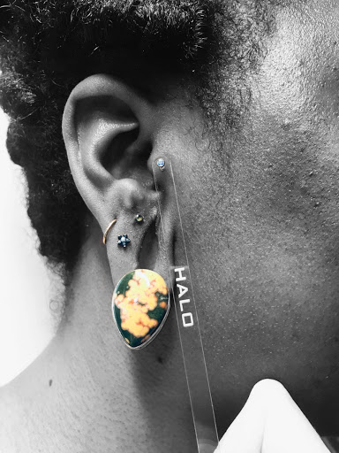 Explore monopoly tattoo ideas, creative tattoo ideas in Phoenix, available at Halo Piercing and Fine Jewelry