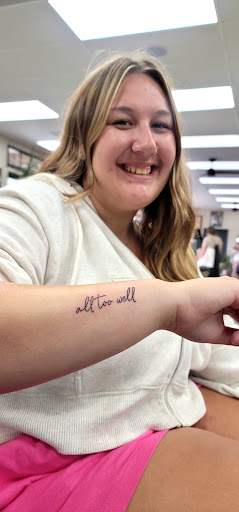 Explore charmander tattoo ideas, creative tattoo ideas in Lees Summit, available at The Cherry Bomb Tattoo Co.