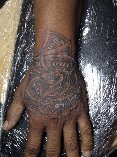 Explore arm tattoo ideas flowers, creative tattoo ideas in Roanoke, available at RailYard INK