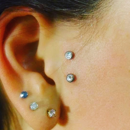 Explore simple hand tattoo ideas, creative tattoo ideas in Gainesville, available at Pizzazz Piercing & Tattoo