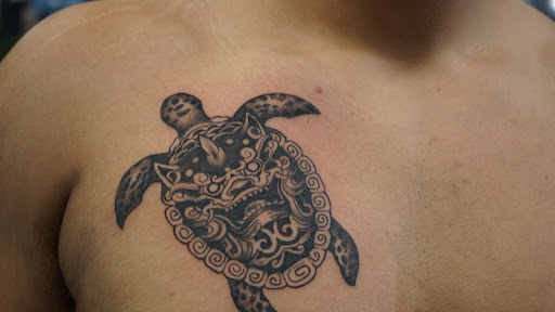 Explore finger hand tattoo ideas, creative tattoo ideas in Los Angeles, available at Monkey Face Tattoos