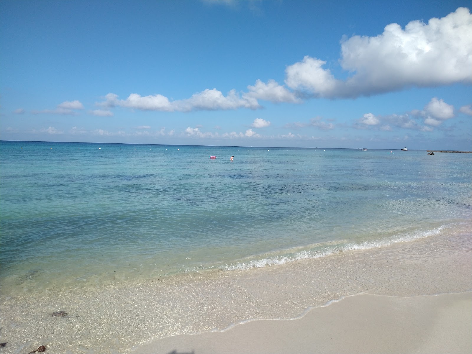 Fotografie cu Cozumel paradise beach cu o linie de coastă spațioasă