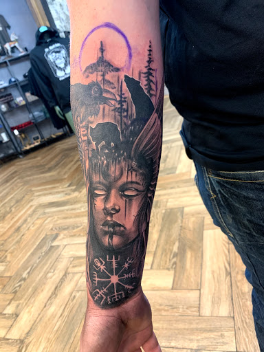 Explore gears of war tattoo ideas, creative tattoo ideas in Rapid City, available at Pinup Parlor Tattoo Studio
