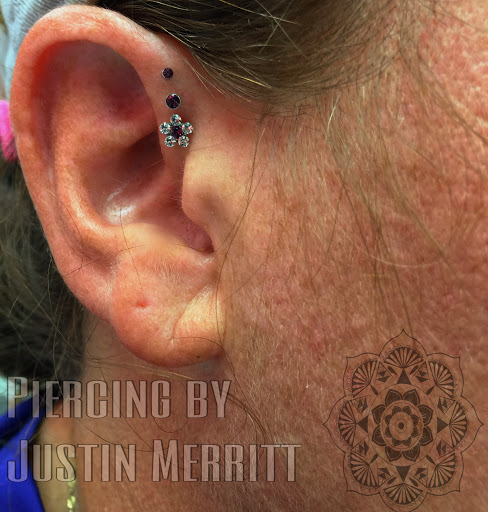 Explore side tattoo ideas for guys, creative tattoo ideas in Hampton, available at Blue Horseshoe Tattoo and Body Piercing