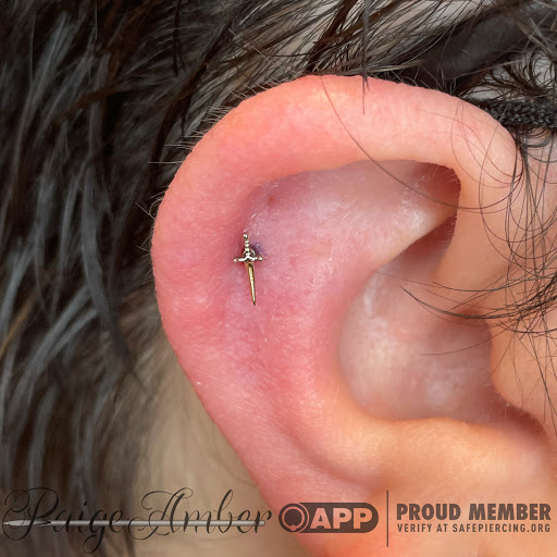 Explore lord of the ring tattoo ideas, creative tattoo ideas in Oshkosh, available at Piercings by Paige at Big Guns Tattoo