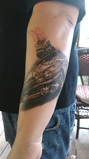 Explore man in the arena tattoo ideas, creative tattoo ideas in Chattanooga, available at Inked Expressions