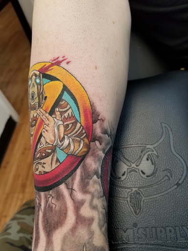 Explore hellscape battle sleeve tattoo ideas, creative tattoo ideas in Georgetown, available at Body Art Tattoos