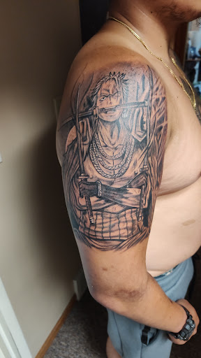 Explore bass tattoo ideas, creative tattoo ideas in South Sioux City, available at Hometown Hustle Tattoo