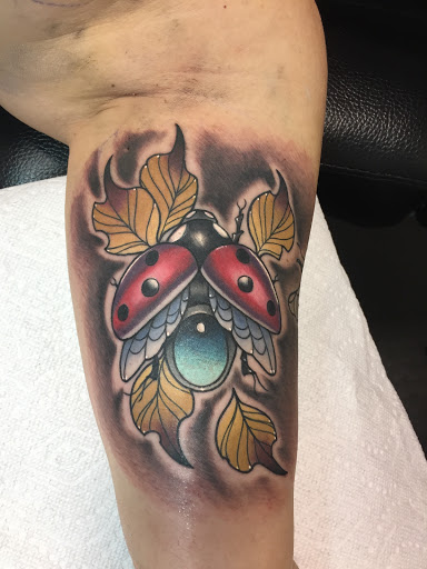 Explore bite me tattoo ideas, creative tattoo ideas in Portland, available at Art Immortal Tattoo and Piercing