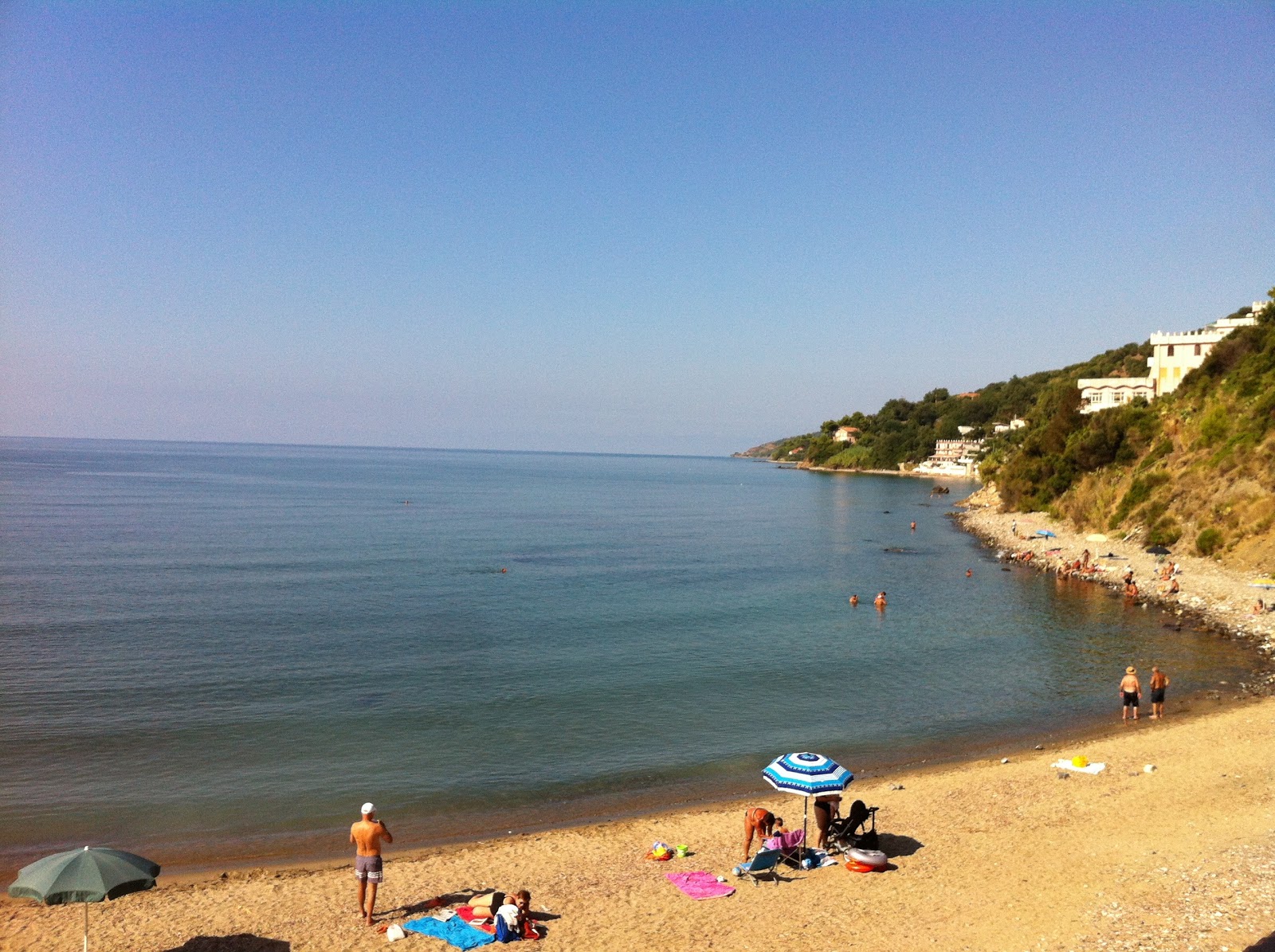 Martina Mare beach'in fotoğrafı kahverengi kum yüzey ile