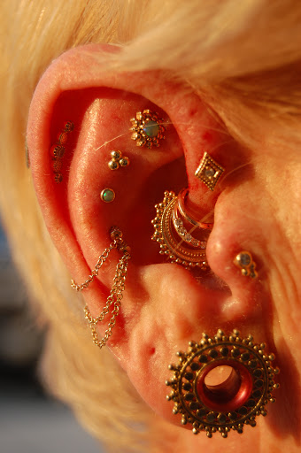 Explore female back tattoo ideas, creative tattoo ideas in Coral Springs, available at AMATO Fine Jewelry & Body Piercing