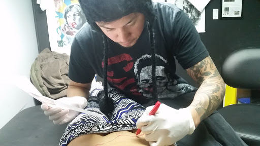 Explore lion and cub tattoo ideas, creative tattoo ideas in Orange Park, available at Diamond Tip Tattoo