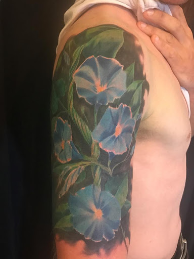 Explore dark hand tattoo ideas, creative tattoo ideas in Amarillo, available at Music Box Body Art Studio