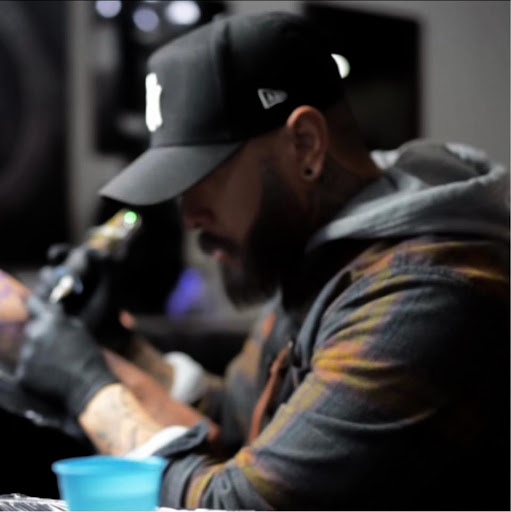 Explore cosmos flower tattoo ideas, creative tattoo ideas in Saint Paul, available at Supreme Art Of War Inc