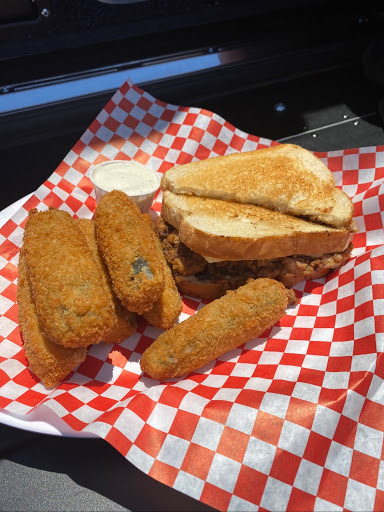 Huli huli chicken sandwich with fried zucchini