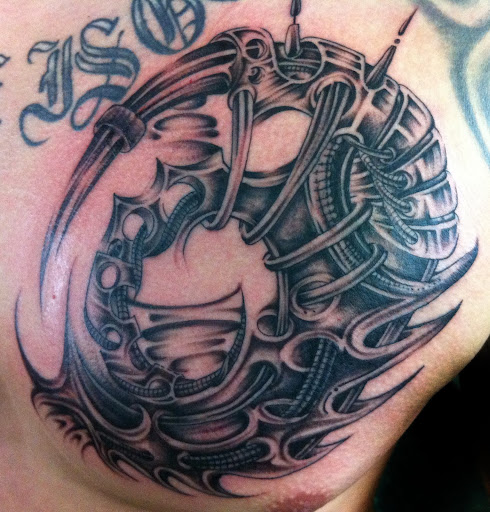 Explore upper chest tattoo ideas, creative tattoo ideas in Rosenberg, available at Special D Ink