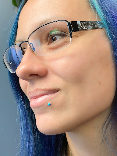 Explore black and white flower tattoo ideas, creative tattoo ideas in Springfield, available at Body Piercing By Qui Qui