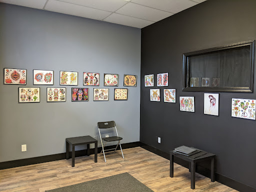 Explore middle of boob tattoo ideas, creative tattoo ideas in Spring Hill, available at Blind Tiger Tattoo and Piercing