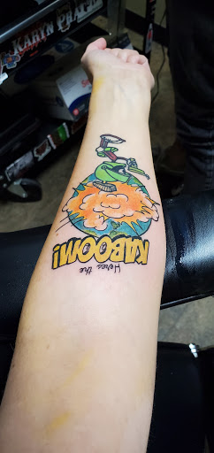 Explore spark plug tattoo ideas, creative tattoo ideas in Phoenix, available at Goliath Tattoo