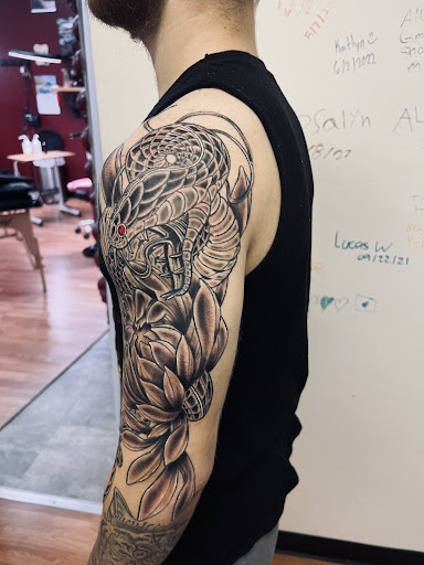 Explore family tattoo sleeve ideas, creative tattoo ideas in Wentzville, available at Jammer Joint Tattoo