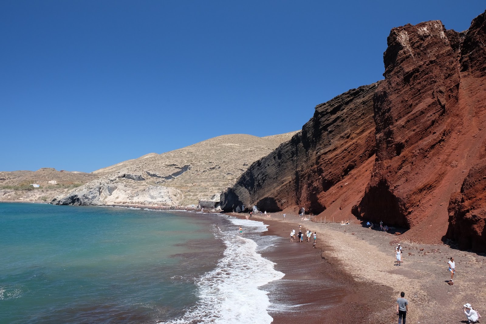 Fotografija Spiaggia Rossa z harmaa hiekka ja kivi površino