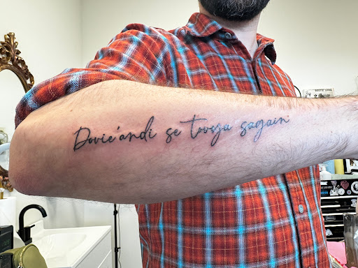 Explore dirt bike tattoos ideas, creative tattoo ideas in Spokane, available at 143 Tattoo Parlor