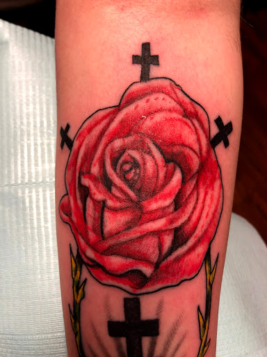 Find cool armband tattoo ideas for your next unique tattoo in Seymour at American Gypsy Tattoo Corp.