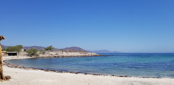 Foto de Playa La Perla com pequena baía