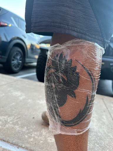 Explore back arm tattoo ideas for guys, creative tattoo ideas in Houston, available at Horitian Tattoo