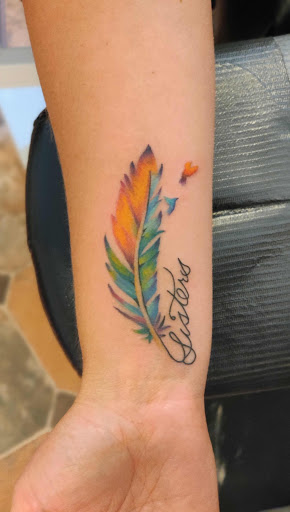 Explore songbird tattoo ideas, creative tattoo ideas in Hebron, available at Explosive Ink Tattoo