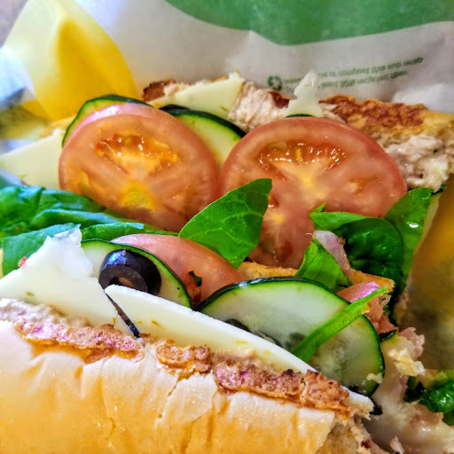This is the tuna, I toast the bread first with onions and green bell peppers on it, I sprinkle salt and pepper and the new garlic and herbs olive oil. I finish it off with cold pepper Jack cheese, spinach and olives. Vinegar and olive oil and cut in half. The toasty bread makes it the most enjoyable