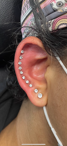 Explore cool guitar tattoo ideas, creative tattoo ideas in Bay Shore, available at Piercings By Dean 95