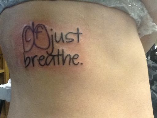 Explore weightlifting tattoo ideas, creative tattoo ideas in Tucson, available at Sacred Art Tattoo Studio