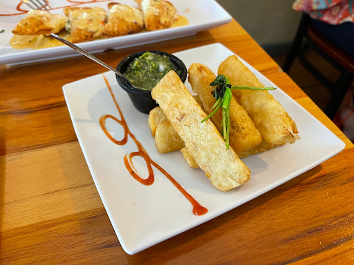 Latin American Restaurant «De La Vega Restaurante y Galeria», reviews and photos, 128 N Woodland Blvd, DeLand, FL 32720, USA