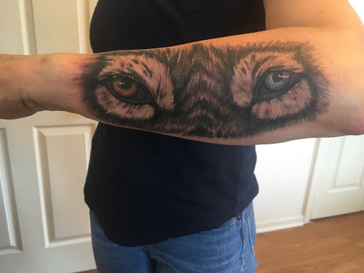 Explore red tattoo ideas, creative tattoo ideas in Madison, available at ART IMMORTAL TATTOO