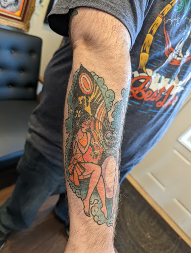 Explore mens behind ear tattoo ideas, creative tattoo ideas in Pittsburgh, available at Black Cat Tattoos