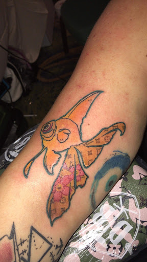 Explore street signs tattoo ideas, creative tattoo ideas in Saint Marys, available at WarHawk Tattoo Company ST MARYS