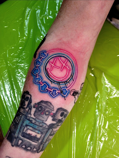 Explore griffin tattoo ideas, creative tattoo ideas in Benton, available at Spectrum Tattoo