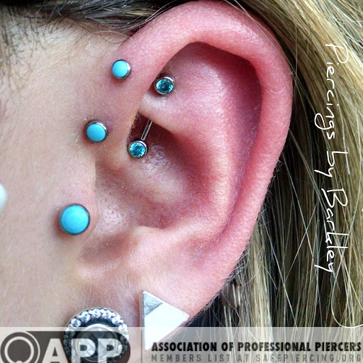 Explore toy story tattoo ideas, creative tattoo ideas in Charleston, available at MOLA Piercing and Fine Jewelry