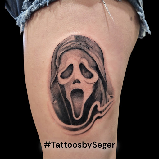 Explore word finger tattoo ideas, creative tattoo ideas in Crystal City, available at Meraki Tattoo and Piercing