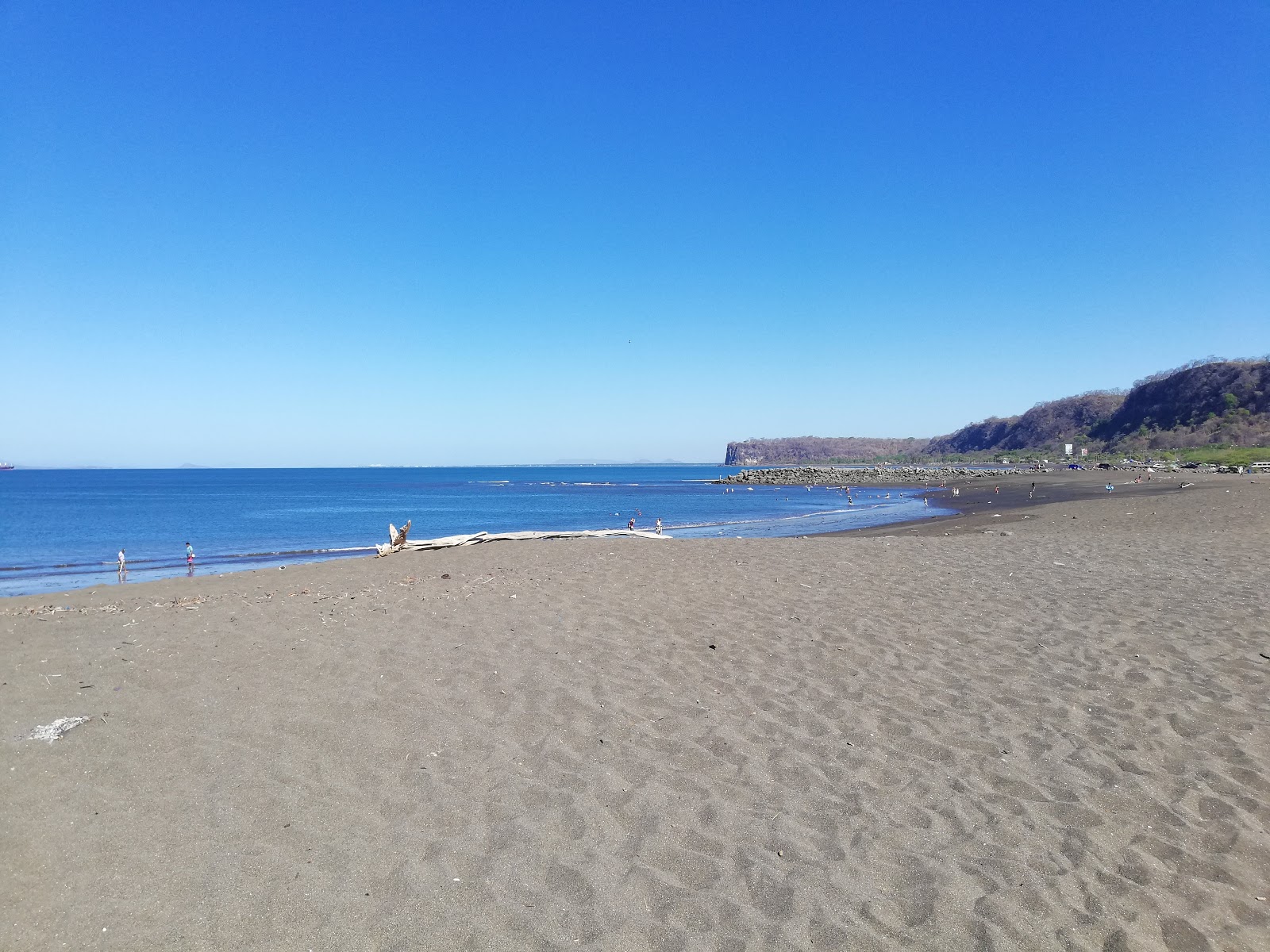 Playa Caldera Bulevar'in fotoğrafı gri kum yüzey ile