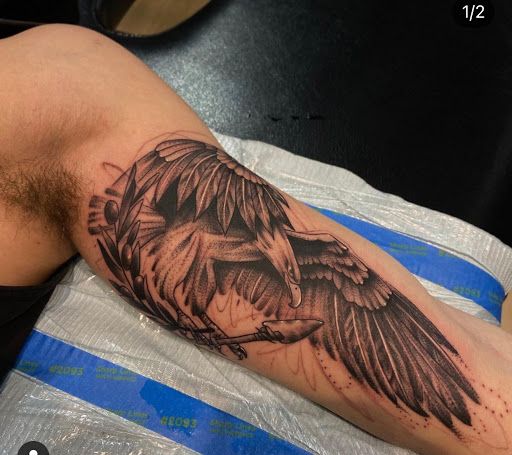 Explore hook tattoo ideas, creative tattoo ideas in Fort Wayne, available at Grade A Tattoos and Body Piercing