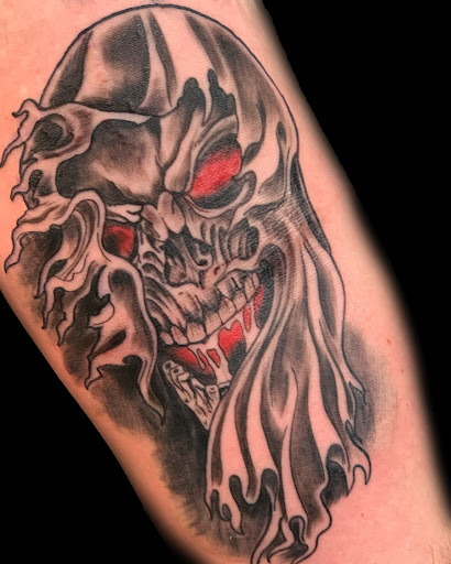 Explore batman logo tattoo ideas, creative tattoo ideas in Milwaukee, available at The Skin Museum