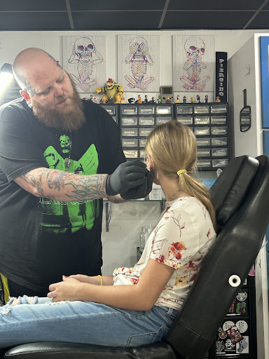Explore father son matching tattoo ideas, creative tattoo ideas in Platteville, available at Legacy Impressions Tattoos & Piercings