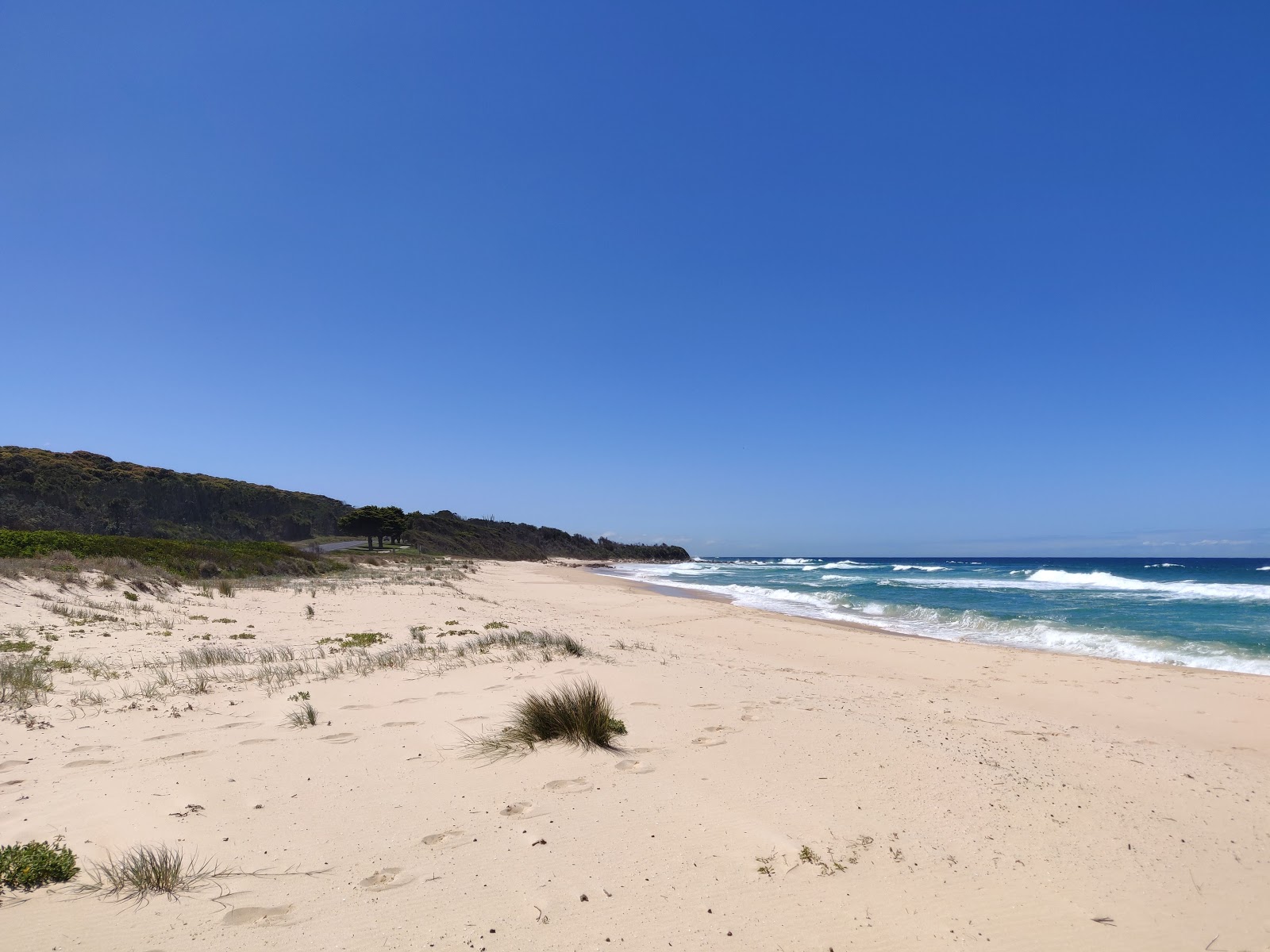 Foto de Kianga Beach com areia bege superfície