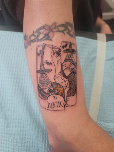 Explore charizard tattoo ideas, creative tattoo ideas in Wakefield, available at Marcos Tattoo