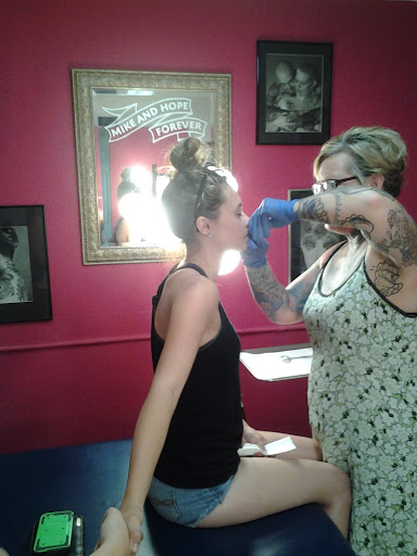 Find bee tattoo ideas for your next unique tattoo in Yakima at Wallflower Body Piercing & Crazy Ink Tattoo