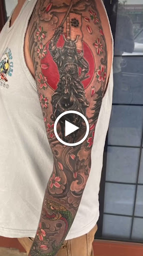 Explore upper back tattoo ideas for men, creative tattoo ideas in Boulder, available at Claw and Talon Tattoo