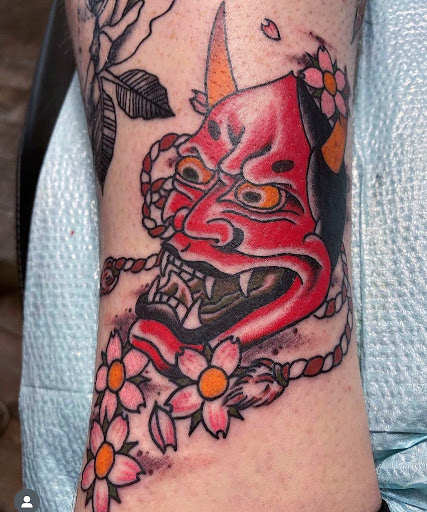 Explore stomach tattoo ideas, creative tattoo ideas in Lakeland, available at Black Swan Tattoo