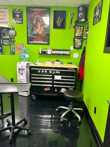 Explore cake tattoo ideas, creative tattoo ideas in Oswego, available at The Inkery Tattoo Studio